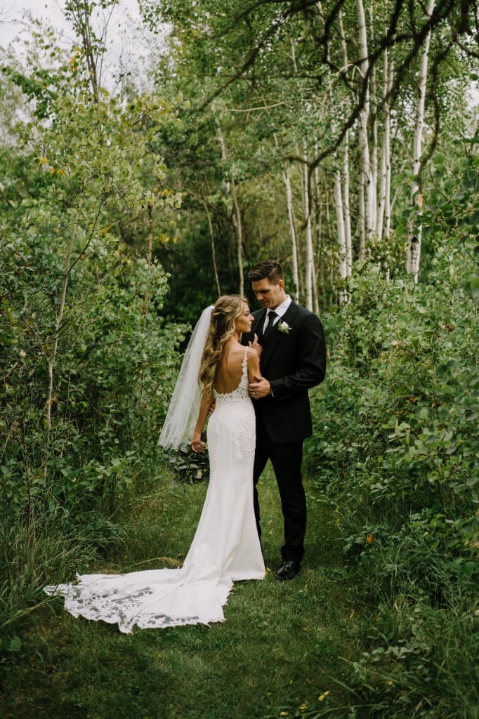 Spencer and Jenna on their wedding day in the forest